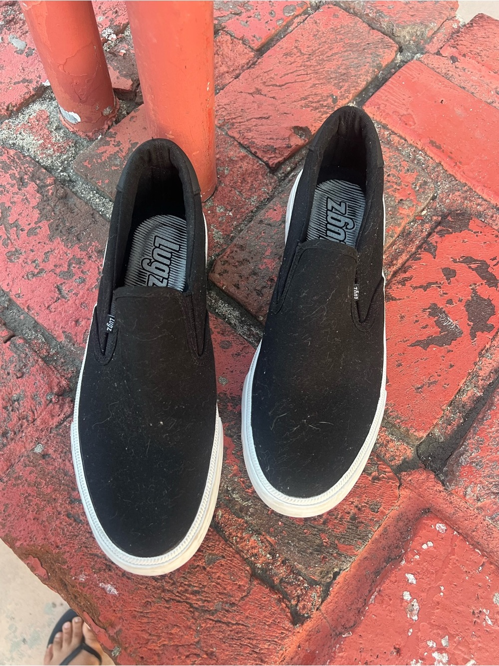 Lugz Black Slip-On Canvas Sneakers with White Sole